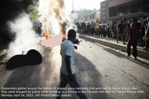 Mob in Haiti capital burns to death 13 suspected gangsters