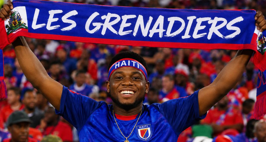 604-Les Grenadiers FAN Banner Haiti's National Football Team proudly carries the historic nickname "Les Grenadiers"—a name that symbolizes courage, resilience, and the fighting spirit of the Haitian people. Supporters continue to honor a legacy rooted in history, unity, and unwavering national pride.