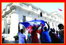Hundreds of Haitians Protest at Haiti’s Embassy in Chile Over Immigration Document Crisis